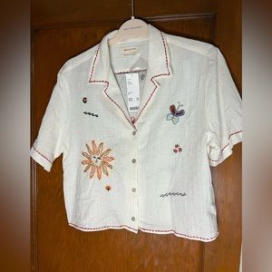 Urban outfitters button up embroidered top- NWT size medium.